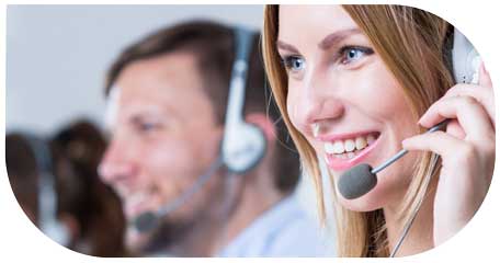 image for Customer Service and Call Centre Recruitment in customer centric recruitment showing smiling young woman wearing earphones on a call with a customer