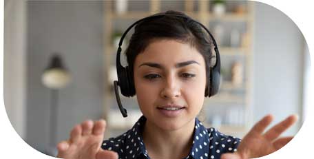 image for Marketing Recruitment in customer centric recruitment showing smiling young woman wearing earphones on a call 